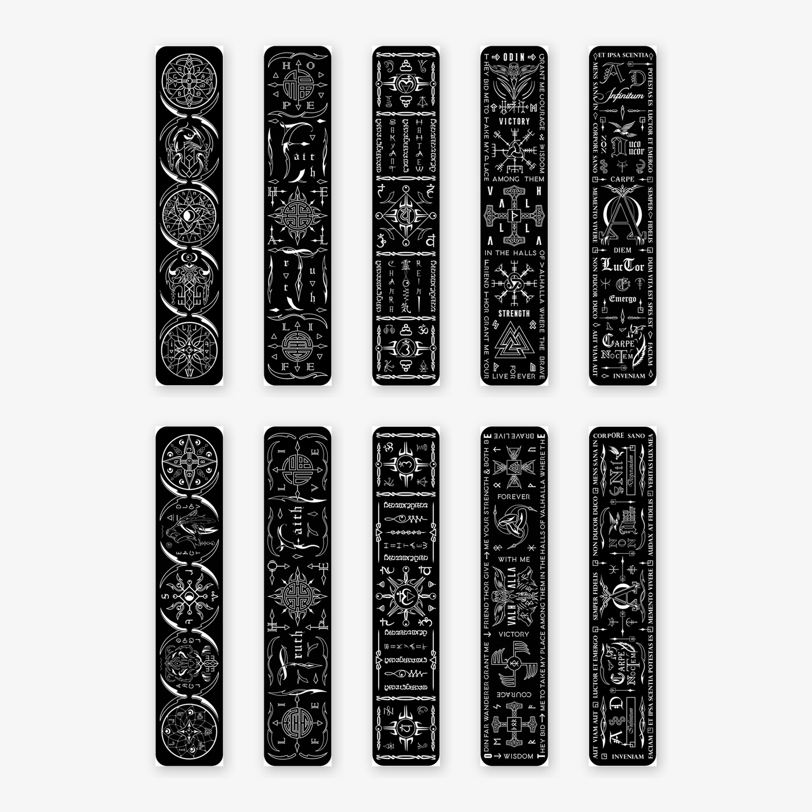 Ten Talisman kinesiology tape strips laid flat, white designs printed on black tape - Viking runes, Reiki chakra, dreamcatcher, Feng Shui and Latin mottoes, each in horizontal and vertical layouts